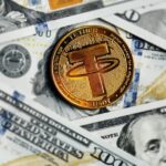 Dólar paralelo baja a Bs 14,7 y Tether anuncia la salida de USDT de cinco redes de criptomonedas